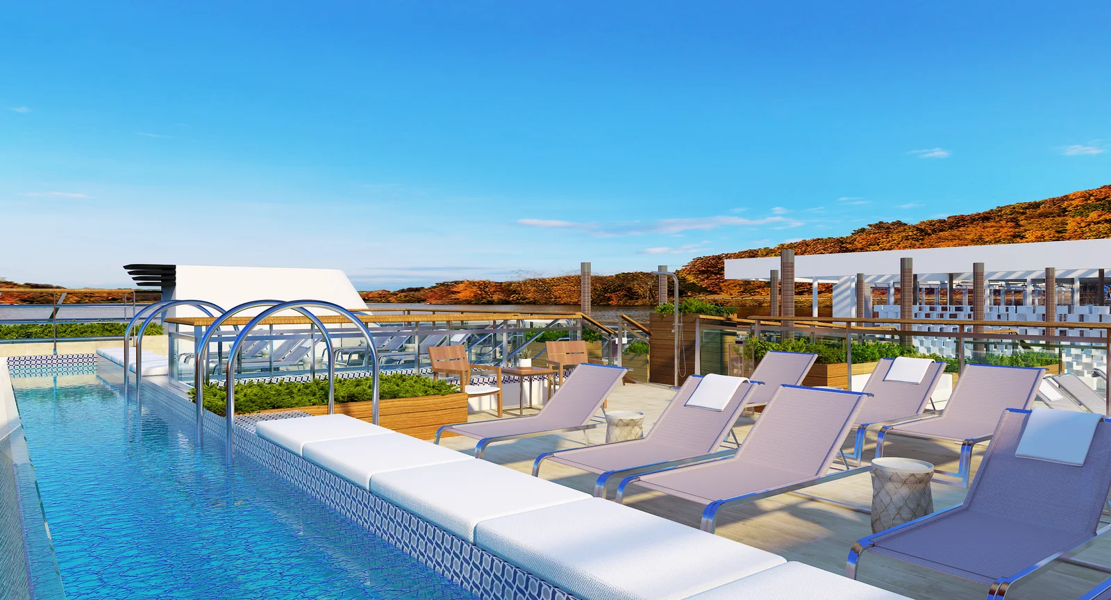 Sun Terrace heated pool and lounge deck on a Viking ocean ship under blue skies
